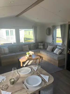 a living room with a couch and a table at 2025 Willerby Ellerton Static Caravan in Morecambe