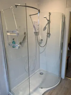 a shower with a glass door in a bathroom at The Gaydon in Lytham St Annes