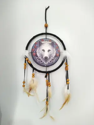 a dream catcher with an image of a wolf at The Dreamcatcher Hotel in Blackpool