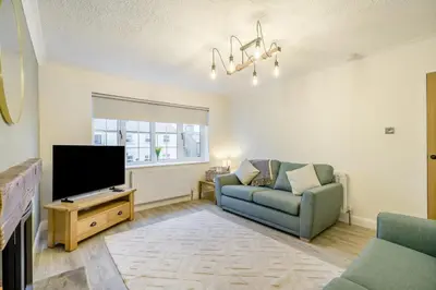 a living room with a couch and a television at 3 Bed in Baycliff oc-b34152 in Baycliff