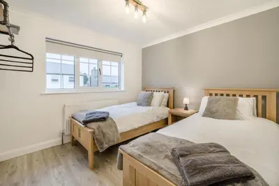 a bedroom with two beds and a window at 3 Bed in Baycliff oc-b34152 in Baycliff