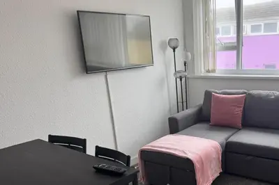 a living room with a couch and a table at 1BR in Blackpool l Sleeps 4 l Contractors in Blackpool