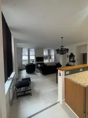 a living room with a couch and a table at Spacious 2 bed Apt Liverpool City Centre in Liverpool