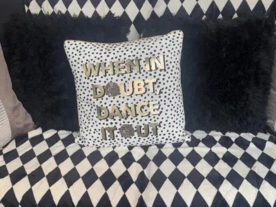 a pillow on a bed with a black and white blanket at Spacious 2 bed Apt Liverpool City Centre in Liverpool