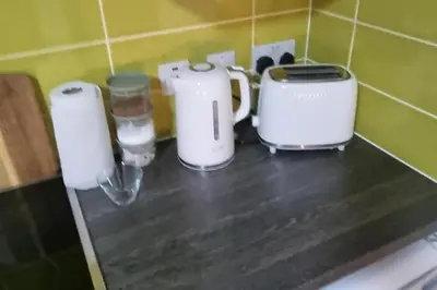 a kitchen counter with two toasters and a toaster at Central Liverpool 1-Bed Apartment City Centre in Liverpool