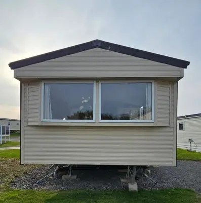 a house with a large window on the side of it at Willerby Seasons in Morecambe