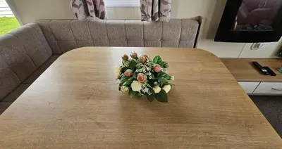 a bouquet of flowers sitting on top of a table at Willerby Seasons in Morecambe