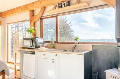a kitchen with a sink and a large window at 1 Bed in Newton In Bowland oc-h34064 in Newton