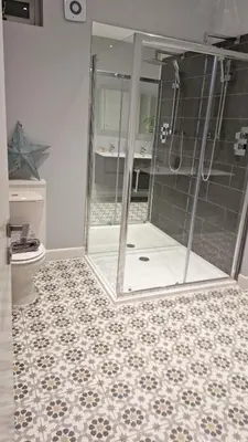 a bathroom with a shower and a toilet at Victorian Suites Apartment in Southport