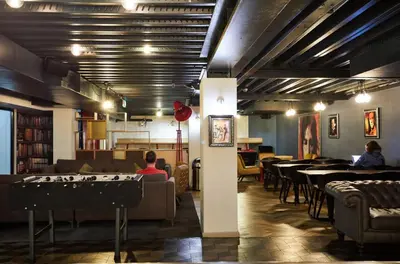 a restaurant with a pool table in the middle of a room at For Students Only Cozy Stays at Crosshall Street in Liverpool