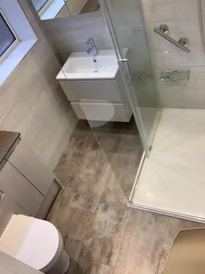 a bathroom with a toilet and a sink and a shower at Newly renovated countryside retreat in Scorton in Scorton
