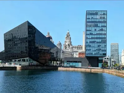 a group of buildings next to a body of water at 5 star Luxury Apartment in City Centre with views in Liverpool