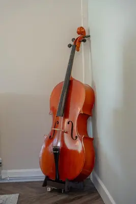 a violin is leaning against a wall at Moorland Bungalow Central Clitheroe in Clitheroe