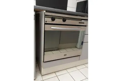 an oven in a kitchen with the door open at Central Albert Dock 2Bed 2Bath in Liverpool