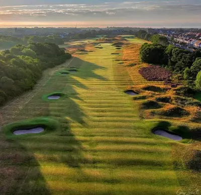 an overhead view of a golf course with many holes at Seaside Serenity in Lytham St Annes