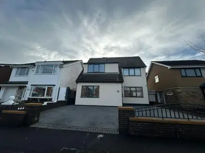 a large white house with a lot of windows at Dalton House - Private Parking in Blackpool