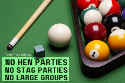 a billiard table with balls and a sign that says no hen parties no size at MyRoomz Tudor Rose Original in Blackpool