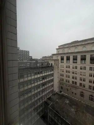 a view from a window of a city with buildings at Stunning City View Studio Apartment by StaySavvy Accommodation in Liverpool
