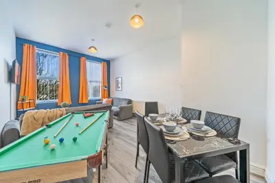 a living room with a pool table and ping pong ball at Latimer Flat 4 - Spacious 2-Bed Apt - Sleeps 6 in Liverpool