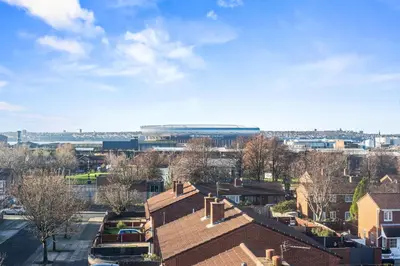 a view of a city with a stadium in the background at Latimer Flat 6 - Spacious 2-Bed Apt - Sleeps 7 in Liverpool