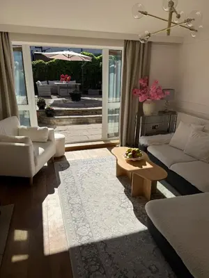 a living room with a couch and a table at Luxurious Ribble Valley Home in Clitheroe