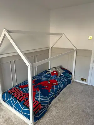 a bedroom with a bed with a spider man bedspread at Luxurious Ribble Valley Home in Clitheroe