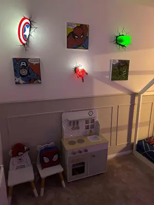 a childs room with a play room with a toy kitchen at Luxurious Ribble Valley Home in Clitheroe