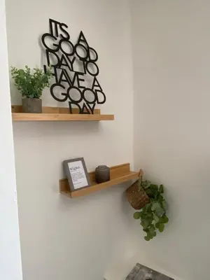 a room with two wooden shelves on the wall at Slick Space for a Wigan Stay - 5 Minutes from M6 and M58 Motorways in Pemberton