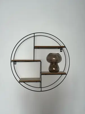 a round glass shelf with a vase on it at Spacious Home From Home, Parking, Contractors in Liverpool
