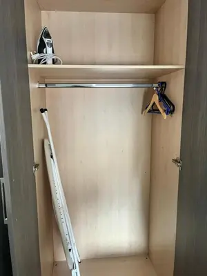 a closet with two shelves and a ladder at The Works Apartments in Liverpool
