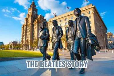 a statue of the beatles in front of a building at The Works Apartments in Liverpool