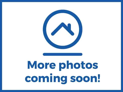 a sign that says more photos coming soon at Morcombe Retreat in Morecambe