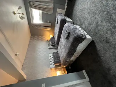 an overhead view of a living room with a couch at The Lenbrook in Blackpool