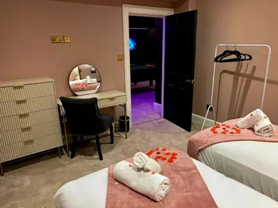 a bedroom with two beds and a desk and a mirror at Hamilton Luxury - The James Suite in Scorton