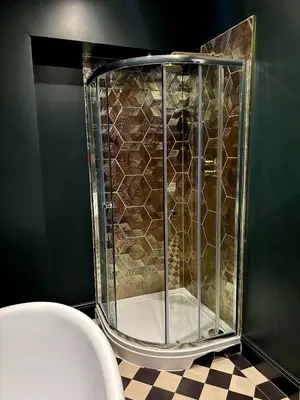 a shower with a glass door in a bathroom at Hamilton Luxury - The James Suite in Scorton