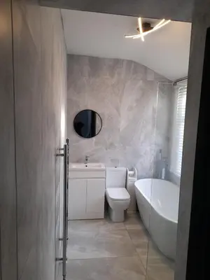 a bathroom with a tub and a toilet and a sink at Cottage terrace Blackpool in Blackpool