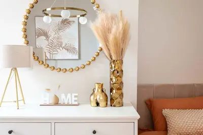 a living room with a table with a vase with feathers at #104 Luxury 4 bed beautiful house in Liverpool in Liverpool