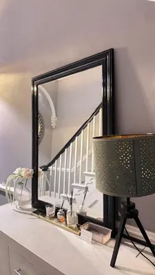 a mirror on top of a dresser with a lamp at Fulwoodroomz in Preston