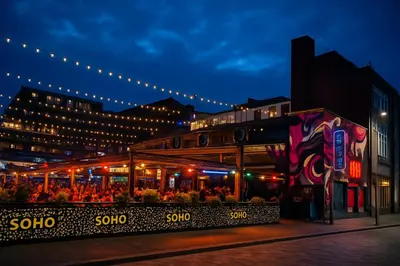 a restaurant with people sitting outside at night at Prime City Apt with Parking - Steps to Bars & Trains in Liverpool