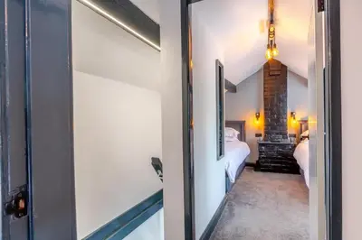 a room with a bedroom with a bed and a window at 2 Bed in Southport oc-h32626 in Southport