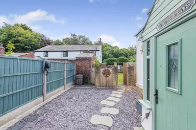 a courtyard with a fence and a gate at 2 Bed in Southport oc-h32626 in Southport