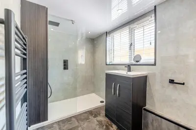 a bathroom with a shower and a sink and a tub at 2 Bed in Southport oc-h32626 in Southport