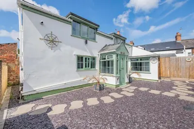 an exterior view of a house with a courtyard at 2 Bed in Southport oc-h32626 in Southport