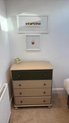 a bedroom with a dresser with a shelf on the wall at 3 Bed in Ulverston oc-m34782 in Ulverston
