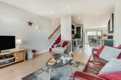 a living room with a couch and a table at 2 Bed in Carnforth oc-s34803 in Warton