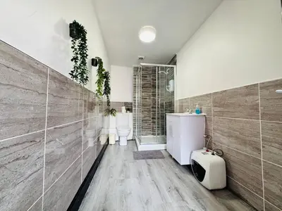 a bathroom with two sinks and a shower at 12B Classy Bedroom in a Shared home at Pembroke in Liverpool