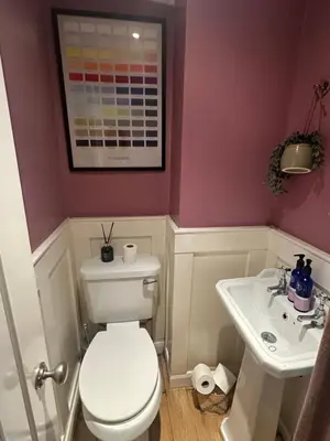a bathroom with a white toilet and a sink at Golf open - walking distance in Ainsdale