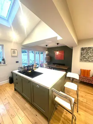 a kitchen with a large island in a room at Golf open - walking distance in Ainsdale