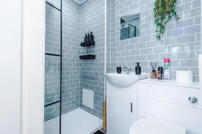 a bathroom with a shower and a sink at Chic Preston Luxe Suite - Perfect for 2 - Free Parking by Parydise Properties in Grimsargh