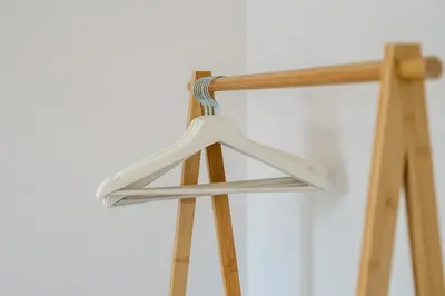 a white hanger on top of a wooden tripod at Cemeas House - Air Host & Stay - Slps 6 - Parking in Liverpool